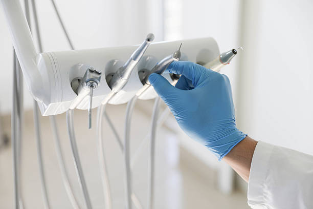 Professional Tooth Extraction technician working in Rock Hill, MO